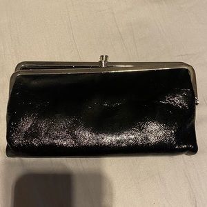 Hobo patent leather clutch in good condition. Note photos please.